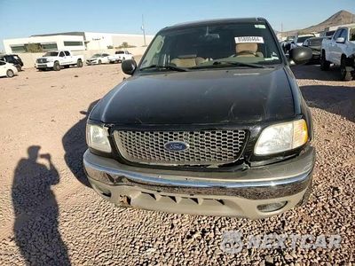 Zdjęcie 10 z 15 samochodu: 2003 FORD F150 SUPERCREW VIN:1FTRW07L83KB70136 - miniatura