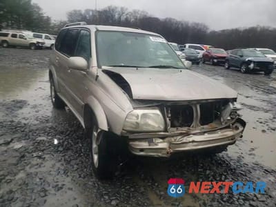 Zdjęcie 12 z 16 samochodu: 2003 SUZUKI XL7 PLUS VIN:JS3TX92V334109931 - miniatura