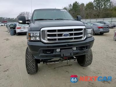 Zdjęcie 11 z 14 samochodu: 2003 FORD EXCURSION LIMITED VIN:1FMSU43P83ED55014 - miniatura