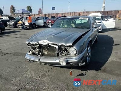Zdjęcie 10 z 14 samochodu: 2002 JAGUAR XJR VIN:SAJDA15B12MF49401 - miniatura