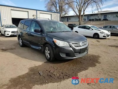 Zdjęcie 12 z 16 samochodu: 2011 VOLKSWAGEN ROUTAN SE VIN:2V4RW3DGXBR642528 - miniatura