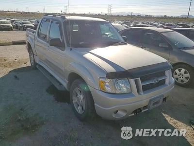 Zdjęcie 9 z 14 samochodu: 2004 FORD EXPLORER SPORT TRAC VIN:1FMDU77K84UA52590 - miniatura