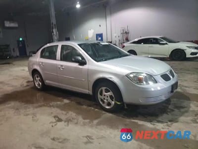 Zdjęcie 11 z 14 samochodu: 2007 PONTIAC G5 VIN:1G2AJ55F577343873 - miniatura
