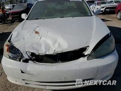 Zdjęcie 10 z 14 samochodu: 2003 TOYOTA CAMRY LE VIN:4T1BF32K83U043985 - miniatura