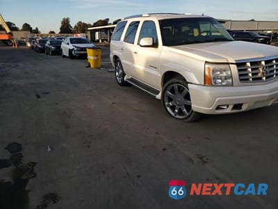 Zdjęcie 12 z 15 samochodu: 2002 CADILLAC ESCALADE LUXURY VIN:1GYEC63T12R147085 - miniatura