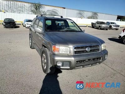 Zdjęcie 14 z 15 samochodu: 2003 NISSAN PATHFINDER LE VIN:JN8DR09X23W706352 - miniatura