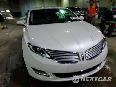 Zdjęcie 14 z 15 samochodu: 2015 LINCOLN MKZ VIN:3LN6L2J97FR600674 - miniatura