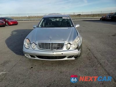 Zdjęcie 13 z 14 samochodu: 2003 MERCEDES-BENZ E 500 VIN:WDBUF70J83A197370 - miniatura