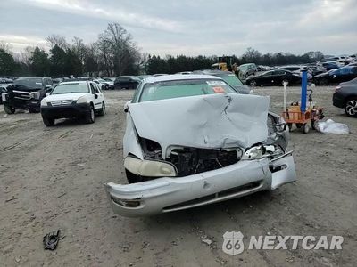 Zdjęcie 13 z 13 samochodu: 2000 BUICK PARK AVENUE VIN:1G4CW52K6Y4109599 - miniatura