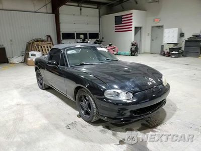 Zdjęcie 13 z 14 samochodu: 1999 MAZDA MX-5 MIATA VIN:JM1NB3532X0102933 - miniatura