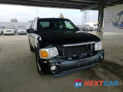 Zdjęcie 13 z 14 samochodu: 2006 GMC ENVOY VIN:1GKDS13S362332224 - miniatura