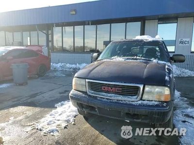Zdjęcie 14 z 14 samochodu: 1999 GMC JIMMY VIN:1GKDT13WXX2558102 - miniatura