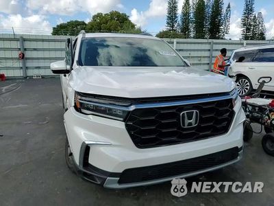 Zdjęcie 14 z 15 samochodu: 2025 HONDA PILOT TOURING VIN:5FNYG2H70SB019907 - miniatura