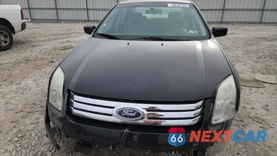 Zdjęcie 13 z 14 samochodu: 2006 FORD FUSION SE VIN:3FAFP07186R193680 - miniatura