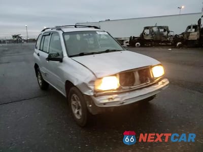 Zdjęcie 15 z 15 samochodu: 2001 CHEVROLET TRACKER VIN:2CNBJ13C016952812 - miniatura
