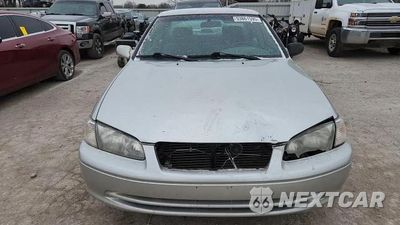 Zdjęcie 13 z 14 samochodu: 2001 TOYOTA CAMRY CE VIN:4T1BG22K41U810848 - miniatura