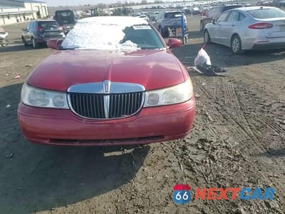 Zdjęcie 13 z 14 samochodu: 1999 LINCOLN TOWN CAR SIGNATURE VIN:1LNHM82W4XY701557 - miniatura