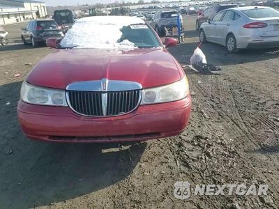 Zdjęcie 13 z 14 samochodu: 1999 LINCOLN TOWN CAR SIGNATURE VIN:1LNHM82W4XY701557 - miniatura