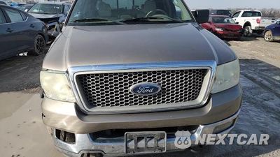 Zdjęcie 13 z 14 samochodu: 2004 FORD F150 SUPERCREW VIN:1FTPW14584KC90913 - miniatura