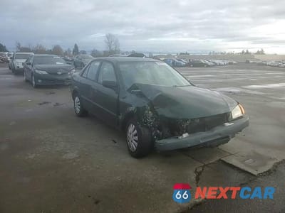 Zdjęcie 13 z 14 samochodu: 2000 MAZDA PROTEGE DX VIN:JM1BJ2225Y0218642 - miniatura