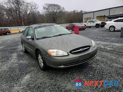 Zdjęcie 13 z 14 samochodu: 2003 FORD TAURUS SEL VIN:1FAHP56S23A100027 - miniatura