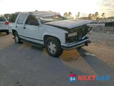 Zdjęcie 14 z 14 samochodu: 1999 CHEVROLET TAHOE K1500 VIN:1GNEK13RXXJ436396 - miniatura
