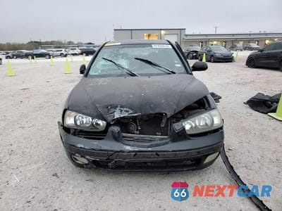 Zdjęcie 13 z 13 samochodu: 2002 HYUNDAI ELANTRA VIN:KMHDN55D92U057946 - miniatura