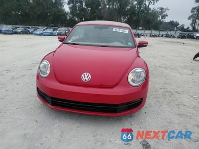Zdjęcie 14 z 15 samochodu: 2015 VOLKSWAGEN BEETLE 1.8T VIN:3VW507AT1FM801174 - miniatura