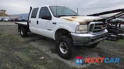 Zdjęcie 13 z 13 samochodu: 1999 FORD F350 SUPER DUTY FLATBED TRUCK VIN:1FTSW31F4XED93400 - miniatura