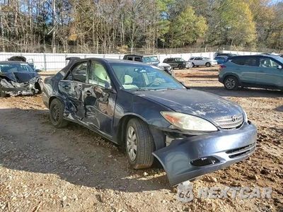 Zdjęcie 13 z 14 samochodu: 2003 TOYOTA CAMRY LE VIN:4T1BE30K33U212171 - miniatura