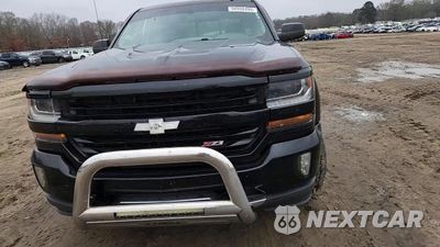 Zdjęcie 13 z 14 samochodu: 2017 CHEVROLET SILVERADO K1500 LT VIN:3GCUKREC1HG409893 - miniatura