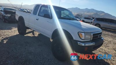 Zdjęcie 13 z 14 samochodu: 1999 TOYOTA TACOMA XTRACAB VIN:4TAWN72N1XZ562939 - miniatura