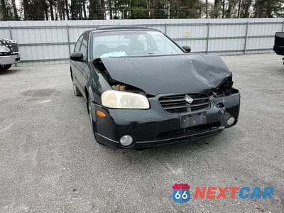 Zdjęcie 13 z 14 samochodu: 2000 NISSAN MAXIMA GLE VIN:JN1CA31A6YT028448 - miniatura