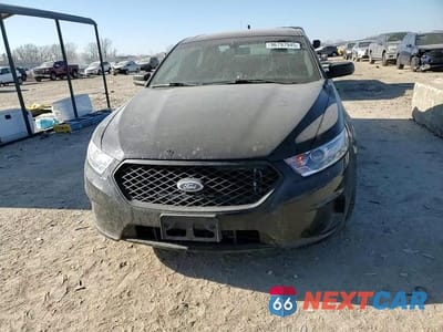 Zdjęcie 13 z 14 samochodu: 2014 FORD TAURUS POLICE INTERCEPTOR VIN:1FAHP2MT5EG127765 - miniatura