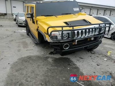 Zdjęcie 14 z 15 samochodu: 2003 HUMMER H2 VIN:5GRGN23U23H136418 - miniatura