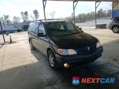 Zdjęcie 13 z 14 samochodu: 2002 PONTIAC MONTANA LUXURY VIN:1GMDX13E72D215537 - miniatura