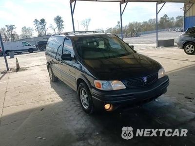 Zdjęcie 13 z 14 samochodu: 2002 PONTIAC MONTANA LUXURY VIN:1GMDX13E72D215537 - miniatura