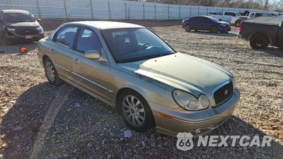 Zdjęcie 13 z 14 samochodu: 2003 HYUNDAI SONATA GLS VIN:KMHWF35H23A873767 - miniatura