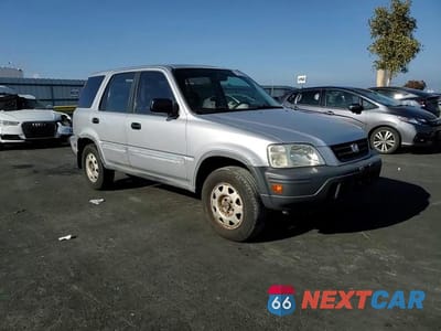 Zdjęcie 14 z 15 samochodu: 1999 HONDA CR-V LX VIN:JHLRD1847XC063777 - miniatura