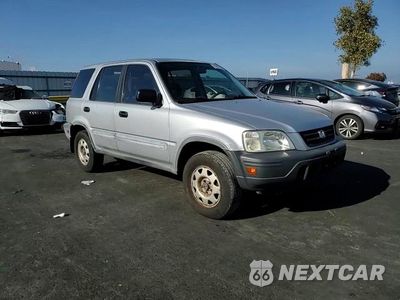 Zdjęcie 14 z 15 samochodu: 1999 HONDA CR-V LX VIN:JHLRD1847XC063777 - miniatura