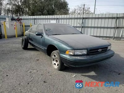Zdjęcie 13 z 14 samochodu: 1996 CHEVROLET CAPRICE / IMPALA CLASSIC SS VIN:1G1BL52P2TR152927 - miniatura
