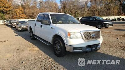 Zdjęcie 13 z 13 samochodu: 2005 FORD F150 SUPERCREW VIN:1FTPW12595KD56115 - miniatura