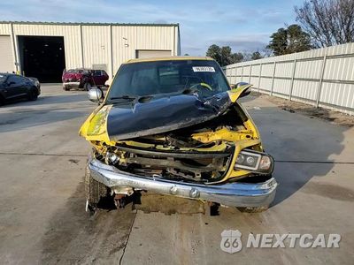 Zdjęcie 14 z 15 samochodu: 2003 FORD F150 VIN:1FTRF07L13KA43275 - miniatura