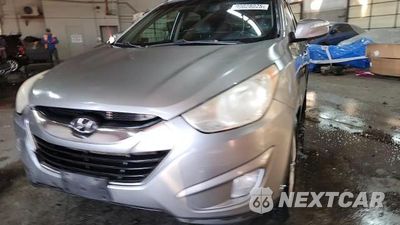Zdjęcie 14 z 15 samochodu: 2012 HYUNDAI TUCSON GLS VIN:KM8JUCAC8CU445307 - miniatura