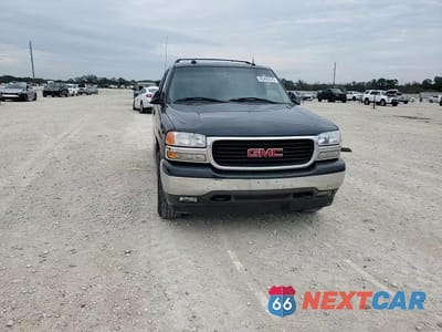 Zdjęcie 14 z 15 samochodu: 2005 GMC YUKON XL C1500 VIN:1GKEC16Z45J191534 - miniatura