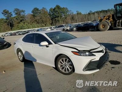 Zdjęcie 13 z 14 samochodu: 2021 TOYOTA CAMRY LE VIN:4T1C11AKXMU561025 - miniatura