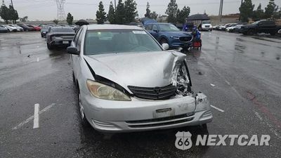 Zdjęcie 13 z 14 samochodu: 2003 TOYOTA CAMRY LE VIN:4T1BE32K33U750446 - miniatura