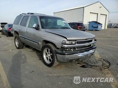 Zdjęcie 14 z 15 samochodu: 2001 CHEVROLET TAHOE K1500 VIN:1GNEK13T81R144802 - miniatura