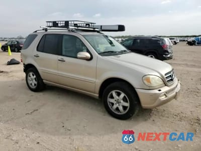 Zdjęcie 13 z 14 samochodu: 2004 MERCEDES-BENZ ML 500 VIN:4JGAB75E44A463198 - miniatura