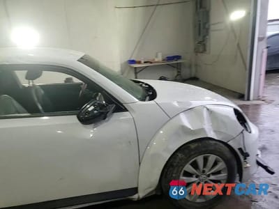 Zdjęcie 13 z 13 samochodu: 2015 VOLKSWAGEN BEETLE 1.8T VIN:3VWF17AT1FM631920 - miniatura